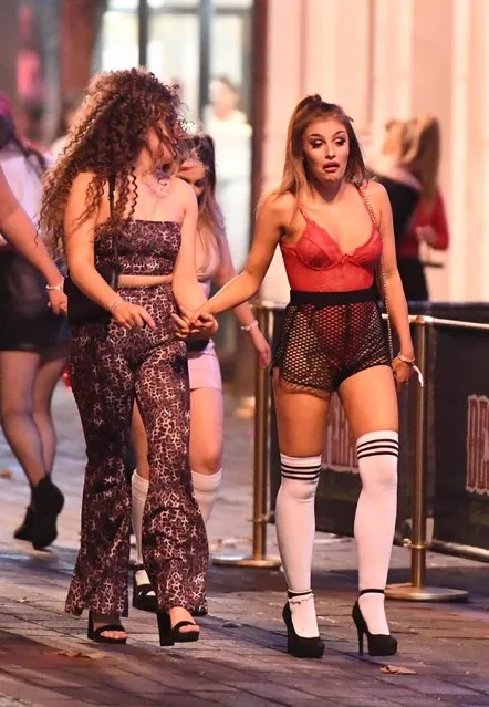 Two students make their way to the club in Portsmouth, United Kingdom last night, on October 31, 2018. Some Halloween revellers will be feeling frightful this morning as they were spotted looking worse for wear at the end of the festivities. (Photo by Paul Jacobs/PictureExclusive.com)