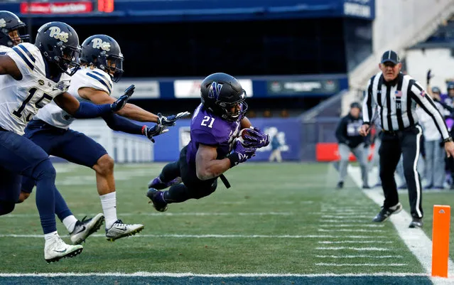 Justin Jackson #21 of the Northwestern Wildcats dives for a touchdown in front of the Pittsburgh Panthers defense during the first half of the New Era Pinstripe Bowl at Yankee Stadium on December 28, 2016 in the Bronx borough of New York City. (Photo by Adam Hunger/Getty Images)