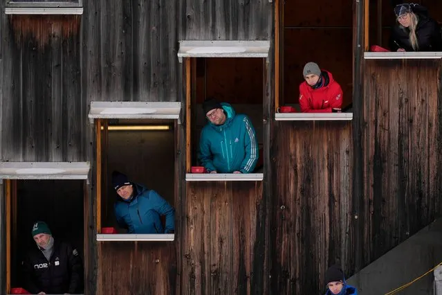 Judges watch athletes during the women's individual compact NH 5km competition at the Nordic Combined World Cup in Ramsau, Austria, Saturday, December 16, 2023. (Photo by Matthias Schrader/AP Photo)
