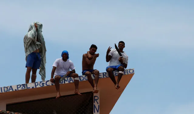 Inmates are seen during an uprising at Alcacuz prison in Natal, Rio Grande do Norte state, Brazil January 20, 2017. (Photo by Nacho Doce/Reuters)