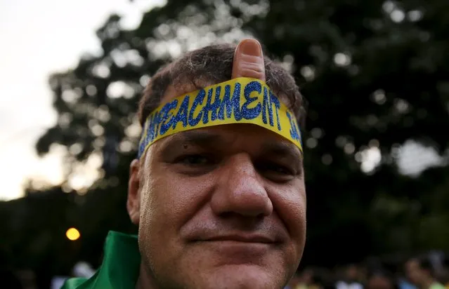 A demonstrator attends a protest against Brazil's President Dilma Rousseff, part of nationwide protests calling for her impeachment, in Sao Paulo, Brazil, March 13, 2016. (Photo by Nacho Doce/Reuters)