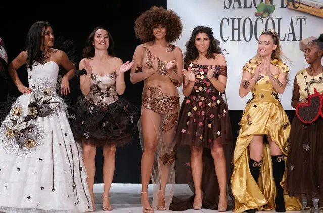 Josephine Jobert, Isabelle Vitari, Alicia Aylies, Yasmine Oughlis, Ines Vandamme and Emerisca walk the runway during the parade of chocolate dresses during the chocolate fair on October 27, 2021 in Paris, France. (Photo by Laurent Viteur/Getty Images)