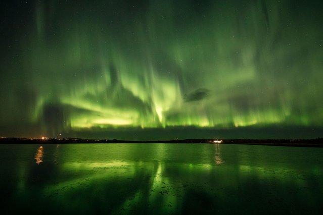 An aurora is seen in the sky in Rovaniemi, Finland on September 13, 2020. (Photo by Alexander Kuznetsov/All About Lapland via Reuters)