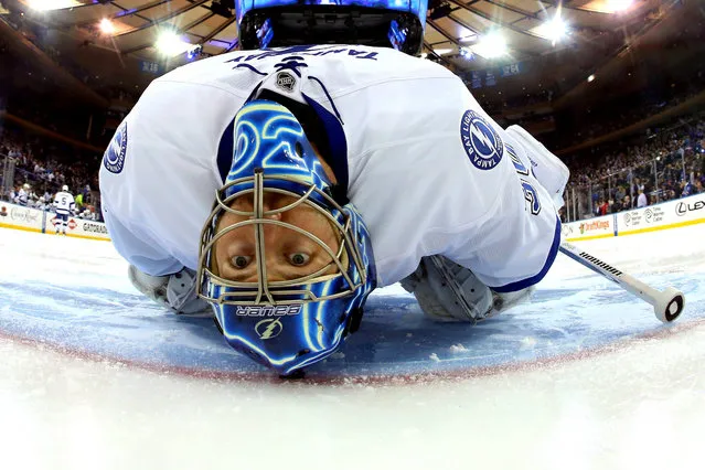 Ben Bishop #30 of the Tampa Bay Lightning stretches before the start of the first period prior to Game Two of the Eastern Conference Finals against the New York Rangers during the 2015 NHL Stanley Cup Playoffs at Madison Square Garden on May 18, 2015 in New York City. (Photo by Bruce Bennett/Getty Images)