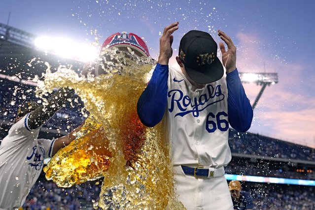 Kansas City Royals relief pitcher James McArthur is doused by teammates after their baseball game against the Oakland Athletics Saturday, May 18, 2024, in Kansas City, Mo. The Royals won 5-3. (Photo by Charlie Riedel/AP Photo)