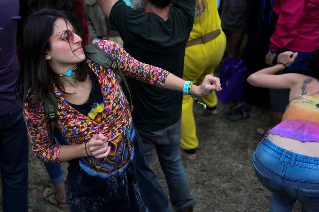 Revelers dance at the Old Settler's Music Festival in Driftwood, Texas, U.S. on April 22, 2017. (Photo by Mohammad Khursheed/Reuters)