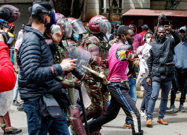 Police members detain a protester at a demonstration over police killings of people protesting against Kenya's proposed finance bill 2024/2025, in Nairobi, Kenya, on June 27, 2024. (Photo by Monicah Mwangi/Reuters)