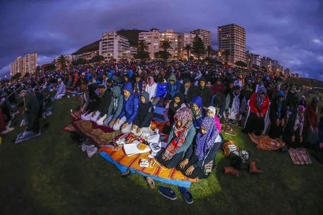 Muslims from South Africa pray during the siting of the moon gathering at the end of the Islamic holy month of Ramadan in Cape Town, South Africa, 16 June 2015. This marks the beginning of Eid al-Fitr, at the end of Ramadan, the holiest month in the Islamic calendar, during which Muslims around the world abstain from eating, drinking and sexual relations from sunrise to sunset. (Photo by Nic Bothma/EPA)