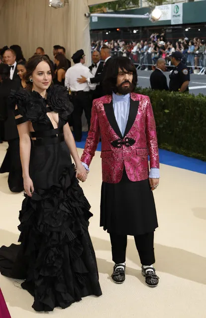 Actress Dakota Johnson and Gucci creative director Alessandro Michele attend “Rei Kawakubo/Comme des Garcons: Art Of The In-Between” Costume Institute Gala – Arrivals at Metropolitan Museum of Art on May 1, 2017 in New York City. (Photo by Lucas Jackson/Reuters)