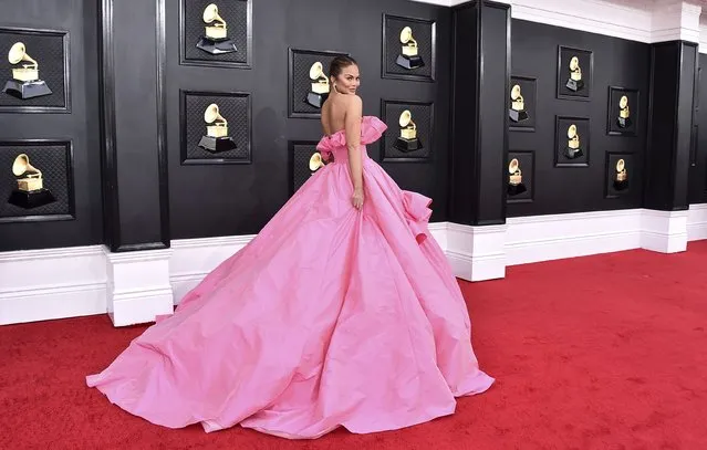 American model and television personality Chrissy Teigen arrives at the 64th Annual Grammy Awards at the MGM Grand Garden Arena on Sunday, April 3, 2022, in Las Vegas. (Photo by Jordan Strauss/Invision/AP Photo)