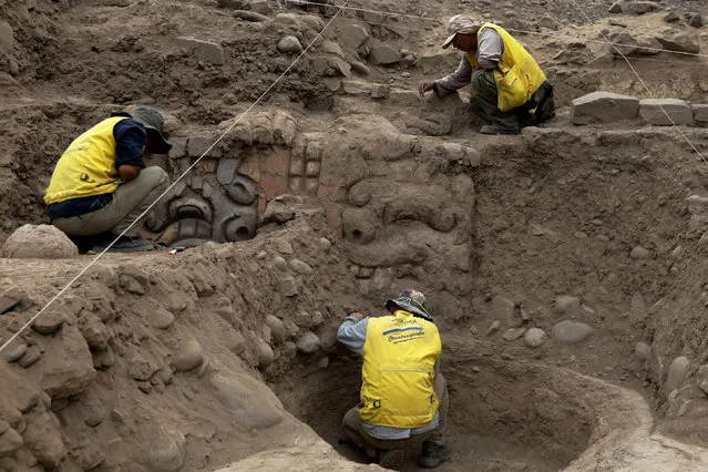 People work at an archaeological site, where 3,500-year-old friezes were recently discovered according to a press release by archaeologist Hector Walde, at Huaca Garagay in Lima, Peru, May 24, 2017. (Photo by Guadalupe Pardo/Reuters)