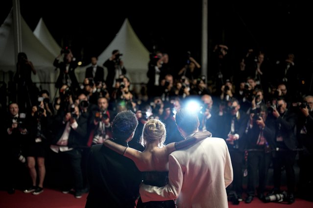 (From L) Canadian singer Abel Makkonen Tesfaye aka The Weeknd, French-US actress Lily-Rose Depp and US director Sam Levinson arrive for the screening of the film “The Idol” during the 76th edition of the Cannes Film Festival in Cannes, southern France, on May 22, 2023. (Photo by Daniel Cole/AP Photo)