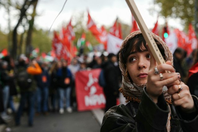 Protesters part in a demonstration to demand an immediate ceasefire in Gaza at Place de la Republique in Paris, on November 11, 2023. Thousands of civilians, both Palestinians and Israelis, have died since October 7, 2023, after Palestinian Hamas militants based in the Gaza Strip entered southern Israel in an unprecedented attack triggering a war declared by Israel on Hamas with retaliatory bombings on Gaza. (Photo by Dimitar Dilkoff/AFP Photo)