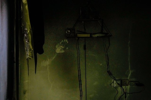 A hand print is seen on a wall of a house damaged by Hamas militants in Kibbutz Kfar Azza, Israel, Sunday, November 5, 2023. The kibbutz was overrun by Hamas militants from the nearby Gaza Strip on Oct. 7, when they killed and captured many Israelis (Photo by Ariel Schalit/AP Photo)