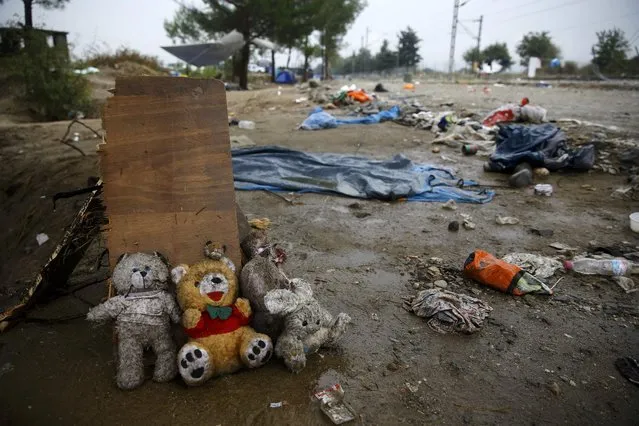 Stuffed animals are seen amongst possessions left behind by migrants and refugees after a rainstorm at the border crossing between Greece and Macedonia, near the Greek village of Idomeni, September 10, 2015. (Photo by Yannis Behrakis/Reuters)