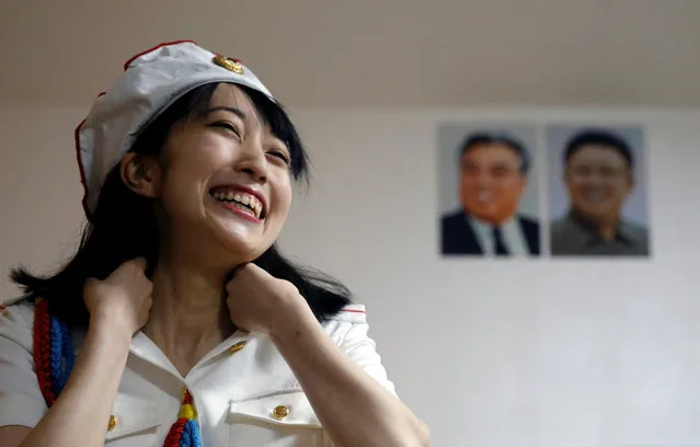 Chunhun, the leader of Japan's North Korea fan club called sengun-joshi smiles as she practices a Moranbong Band dance in Tokyo, Japan on November 2, 2017. (Photo by Toru Hanai/Reuters)