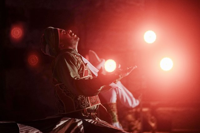 A dervish spins during a religious performance to mark the holy month of Ramadan at Sultan Qansuh al-Ghuri complex in Cairo, Egypt, Wednesday, March 12, 2025. (Photo by Amr Nabil/AP Photo)