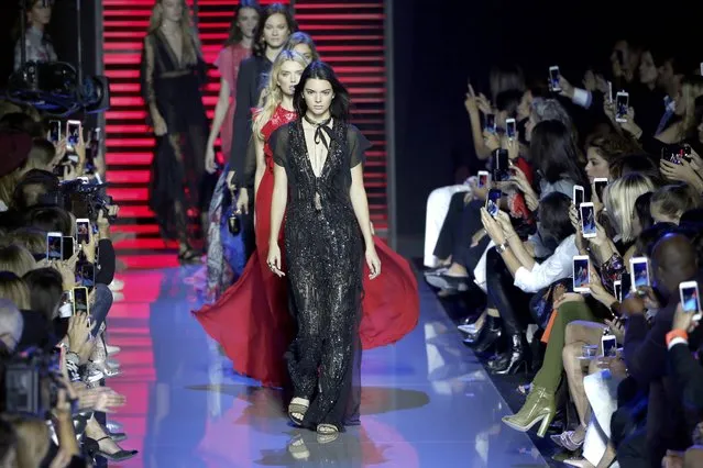 Model Kendall Jenner leads models at the end of Elie Saab's Spring/Summer 2016 women's ready-to-wear collection during Fashion Week in Paris, France, October 3, 2015. (Photo by Charles Platiau/Reuters)