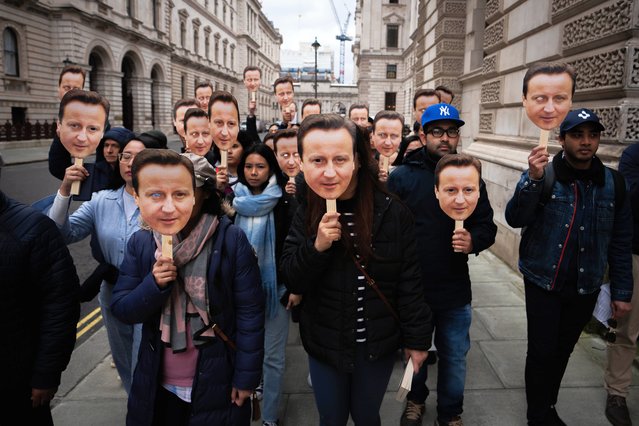 Protesters from Stars of Myanmar Friendship and the Burma Campaign UK, wearing Lord Cameron masks, take part in a demonstration outside the Foreign Office in London on Wednesday, March 13, 2024, against the “snail's pace of implementation of new sanctions against the Myanmar military”. (Photo by James Manning/PA Images via Getty Images)