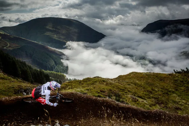 Gee Atherton makes his way downhill at the Red Bull Hardline, one of the toughest downhill mountain bike races on September 18, 2016. The demanding course in the hills of Dinas Mawddwy, Wales, features gap jumps, giant slab rolls and tight wood sections. Anderson was the first down the course in a time of 3m 35.97s and eventually finished fourth. The event was won by the last rider down the course, Bernard Kerr, who set a course record of 3m 32.46s. (Photo by Dan Hearn/Red Bull Content Pool)
