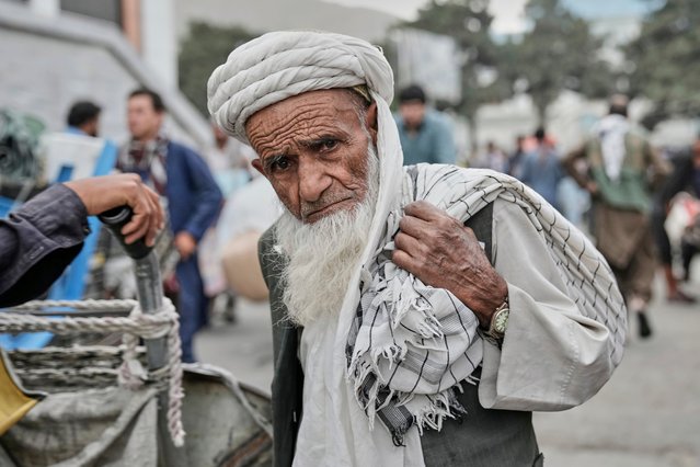 A man shops at the old market in Kabul, Afghanistan, Sunday, May 25, 2025. (Photo by Ebrahim Noroozi/AP Photo)