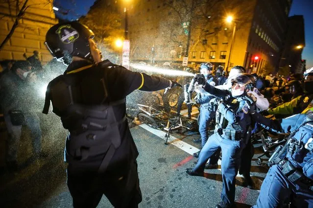 Proud Boys and Antifa fight after the “Million MAGA March” from Freedom Plaza to the US Capitol in Washington, DC, United States on December 12, 2020. Rally held to back President Donald Trump's unsubstantiated claims of voter fraud in the US election. (Photo by Tayfun Coskun/Anadolu Agency via Getty Images)