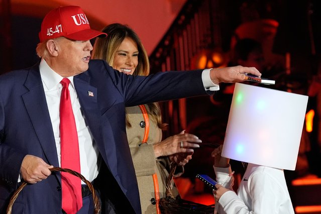 President Donald Trump and first lady Melania Trump participate in a Halloween at the White House event on the South Lawn, Thursday, October 30, 2025, in Washington. (Photo by Alex Brandon/AP Photo)