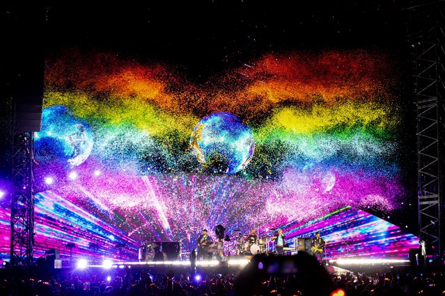 British rock band Coldplay performs on stage during a concert at the Ernst Happel Stadium in Vienna, Austria on August 21, 2024. Security measures have been tightened in Vienna for a series of concerts by British band Coldplay this week, Austrian police said on August 20, 2024, after Taylor Swift's shows were cancelled after a suicide bombing plot. (Photo by Tobias Steinmaurer/APA via AFP Photo)