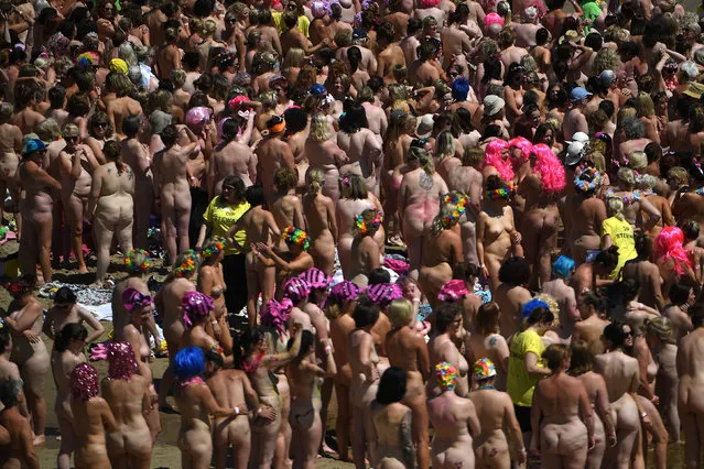 2505 women break a Guinness World record for the largest number of people skinny dipping together and at the same time raising money for the children's cancer charity “Aoibheann's Pink Tie” on Magheramore beach near Wicklow, Ireland, June 9, 2018. (Photo by Clodagh Kilcoyne/Reuters)