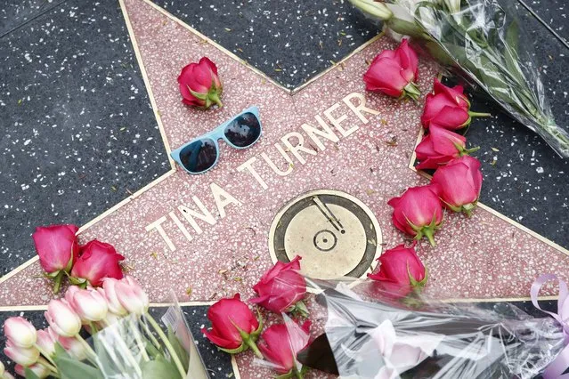 Flowers lie across US singer Tina Turner’s Hollywood Walk of Fame Star in Los Angeles, California, USA, 24 May 2023. Turner died on 24 May after a long illness at her home in Switzerland. (Photo by Caroline Brehman/EPA)