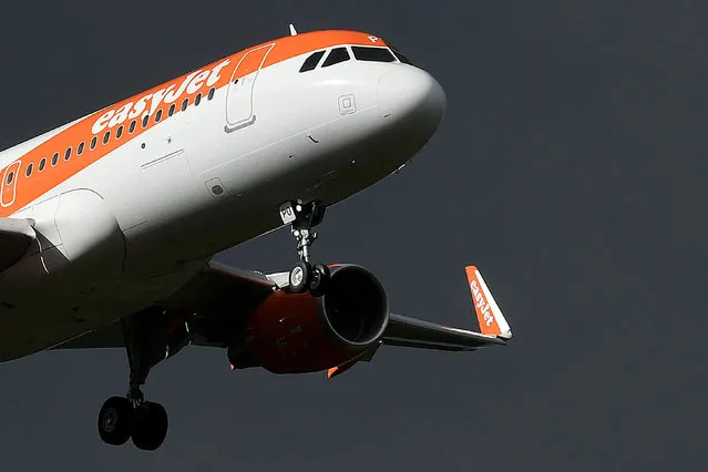 An EasyJet passenger aircraft makes its final approach for landing at Gatwick Airport, Britain, October 9, 2016. (Photo by Toby Melville/Reuters)