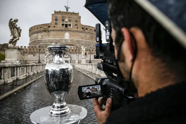 The trophy of the UEFA Euro 2020 football competition is pictured on Sant'Angelo bridge on April 20, 2021 in Rome. (Photo by Fabio Frustaci/ANSA/AFP Photo)