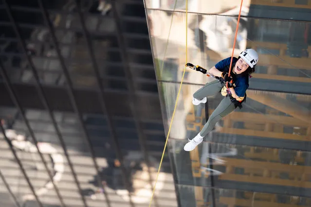 English actress Jess Impiazzi abseils during the inaugural London Landmarks Skyscraper Challenge at the Leadenhall Building, also known as the Cheesegrater, in London on Saturday, September 9, 2023. (Photo byJames Manning/PA Wire)