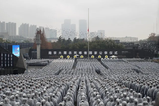 China holds memorial ceremony to mark the National Memorial Day for Nanjing Massacre Victims in Nanjing, Jiangsu province, China, December 13, 2016. (Photo by Reuters/Stringer)