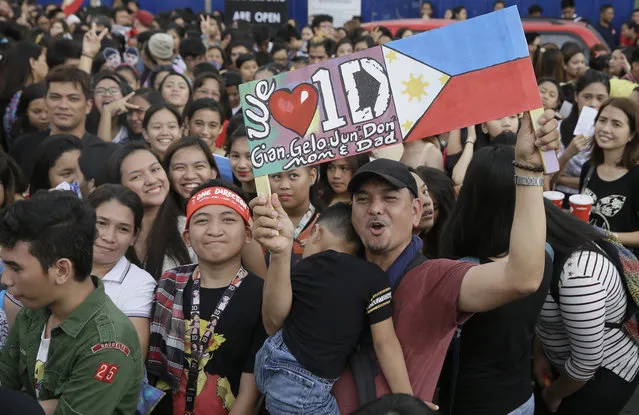 Thousands of Filipino fans line up for the One Direction concert Saturday, March 21, 2015 in the suburban Pasay city south of Manila, Philippines. (Photo by Bullit Marquez/AP Photo)