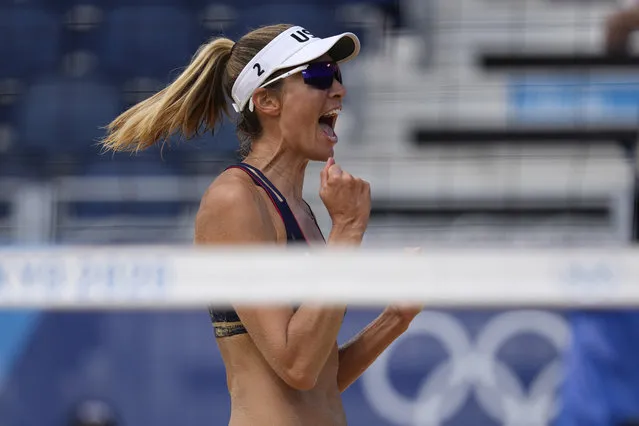 Alix Klineman, of the United States, reacts to a play during a women's beach volleyball match against Cuba at the 2020 Summer Olympics, Monday, August 2, 2021, in Tokyo, Japan. (Photo by Petros Giannakouris/AP Photo)