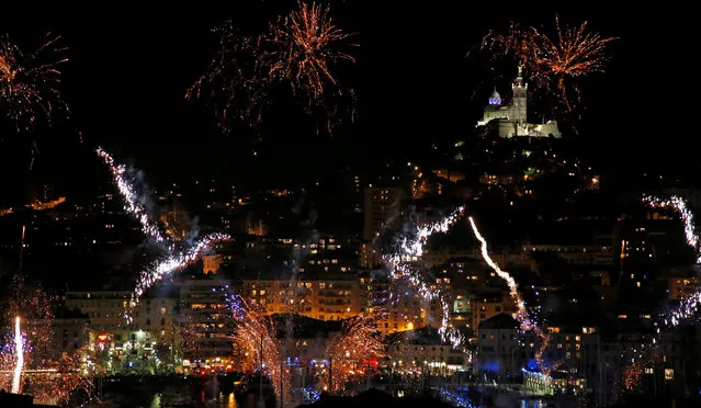 Fireworks light the sky off the Old Harbour to mark Marseille's nomination as 2017 European Capital of Sport in Marseille, France, January 14, 2017. (Photo by Jean-Paul Pelissier/Reuters)
