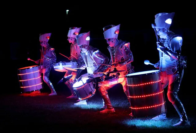 Street performers LED Spark Drummers perform at the South Shields and Westoe Rugby club in South Shields, Britain on November 4, 2022. (Photo by Lee Smith/Reuters)