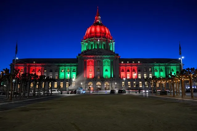 San Francisco City Hall is illuminated as Red-Green and Black during a Black History Month Celebration held at the City Hall in San Francisco, California, United States on February 28, 2024. (Photo by Tayfun Coskun/Anadolu via Getty Images)
