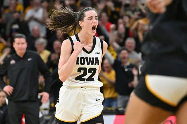 Iowa basketball star Caitlin Clark reacts Sunday, March 3, 2024 after she passed “Pistol” Pete Maravich to became the all-time leading scorer in NCAA Division I basketball – male or female. (Photo by Jeffrey Becker/USA Today Sports via Reuters)