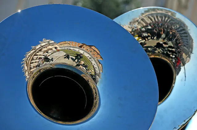 St Peter Basilica mirrored in the bell of an euphonium during the Pope's general audience in St Peter Square, in Vatican City, 08 April 2015. (Photo by Alessandro Di Meo/EPA)