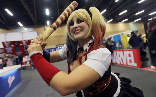 An attendee, dressed as their favourite comic character, poses for photographs during Comic Con Colombia in Bogota, Colombia on May 31, 2019. (Photo by Luisa Gonzalez/Reuters)