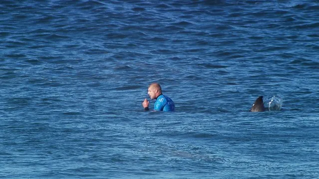 Mick Fanning of Australia is seen shortly before being attacked by a shark during the finals of the J-Bay Open in Jeffrey's Bay, South Africa, in this July 19, 2015 handout courtesy of World Surf League. (Photo by Reuters/World Surf League)