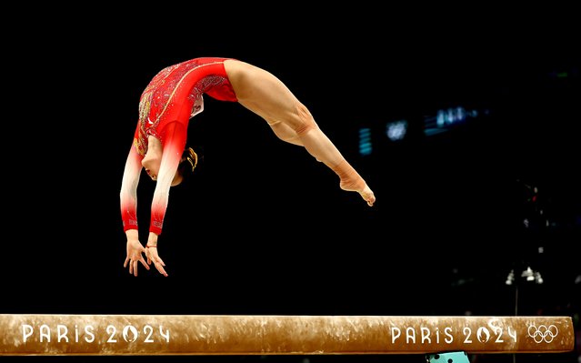 Zhou Yaqin of China performs on the Balance Beam during the Women Team final of the Artistic Gymnastics competitions in the Paris 2024 Olympic Games, at the Bercy Arena in Paris, France, 30 July August 2024. (Photo by Anna Szilagyi/EPA/EFE)