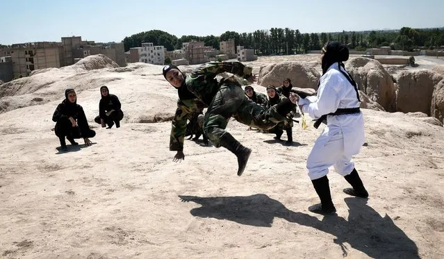 Iranian women perform as they train Far East Fighting Arts to be able to defend themselves, at the Jughin castle which is located 40 km's far from Tehran, Iran on June 5, 2017. (Photo by Fatemeh Bahrami/Anadolu Agency/Getty Images)