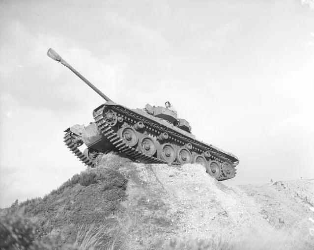 A centurion tank perched on a rocky ridge. Developed in 1944, the centurion first saw action in the Korean War, 21st January 1952.  (Photo by Express)
