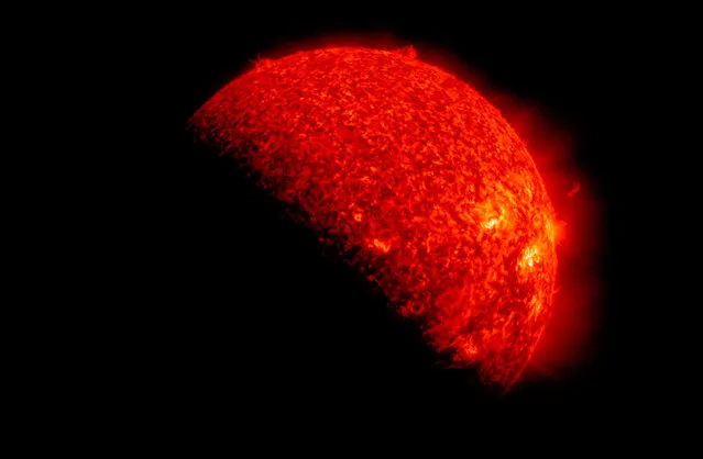 NASA's Solar Dynamics Observatory (SDO) spacecraft took this image showing the Sun being partially blocked by Earth on September 6, 2012. Twice a year, for three weeks near the equinox, NASA's Solar Dynamics Observatory (SDO) moves into its eclipse season – a time when Earth blocks its view of the sun for a period of time each day. The Solar Dynamics Observatory (SDO) is a NASA mission which will observe the Sun for over five years. (Photo by Reuters/NASA/SDO/Handout)