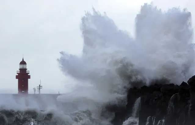 Waves crash on the eastern coast of Jeju Island, South Korea, as Typhoon Hinnamnor travels toward the Korean Peninsula on Sunday, September 4, 2022. Cities in eastern China suspended ferry services and classes and flights were canceled in Japan on Sunday as Typhoon Hinnamnor, the strongest global storm this year, blew its way past Taiwan and the Koreas with fierce winds and heavy rains. (Photo by Han Sang-kyun/Yonhap via AP Photo)