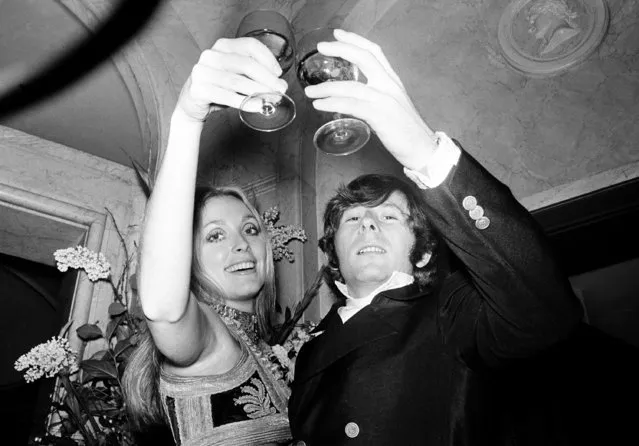 Film director Roman Polanski and his wife, actress Sharon Tate, lift their glasses in a toast at the premiere of his film “Rosemary's Baby” in London, England, January 23, 1969. (Photo by AP Photo)