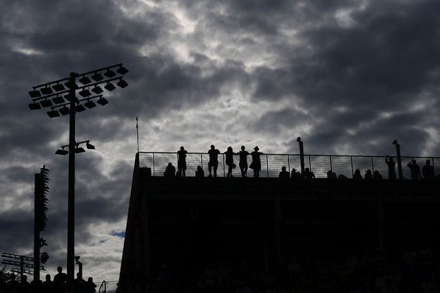 Spectators watch play during the second round of the U.S. Open tennis championships, Wednesday, August 27, 2025, in New York. (Photo by Kirsty Wigglesworth/AP Photo)
